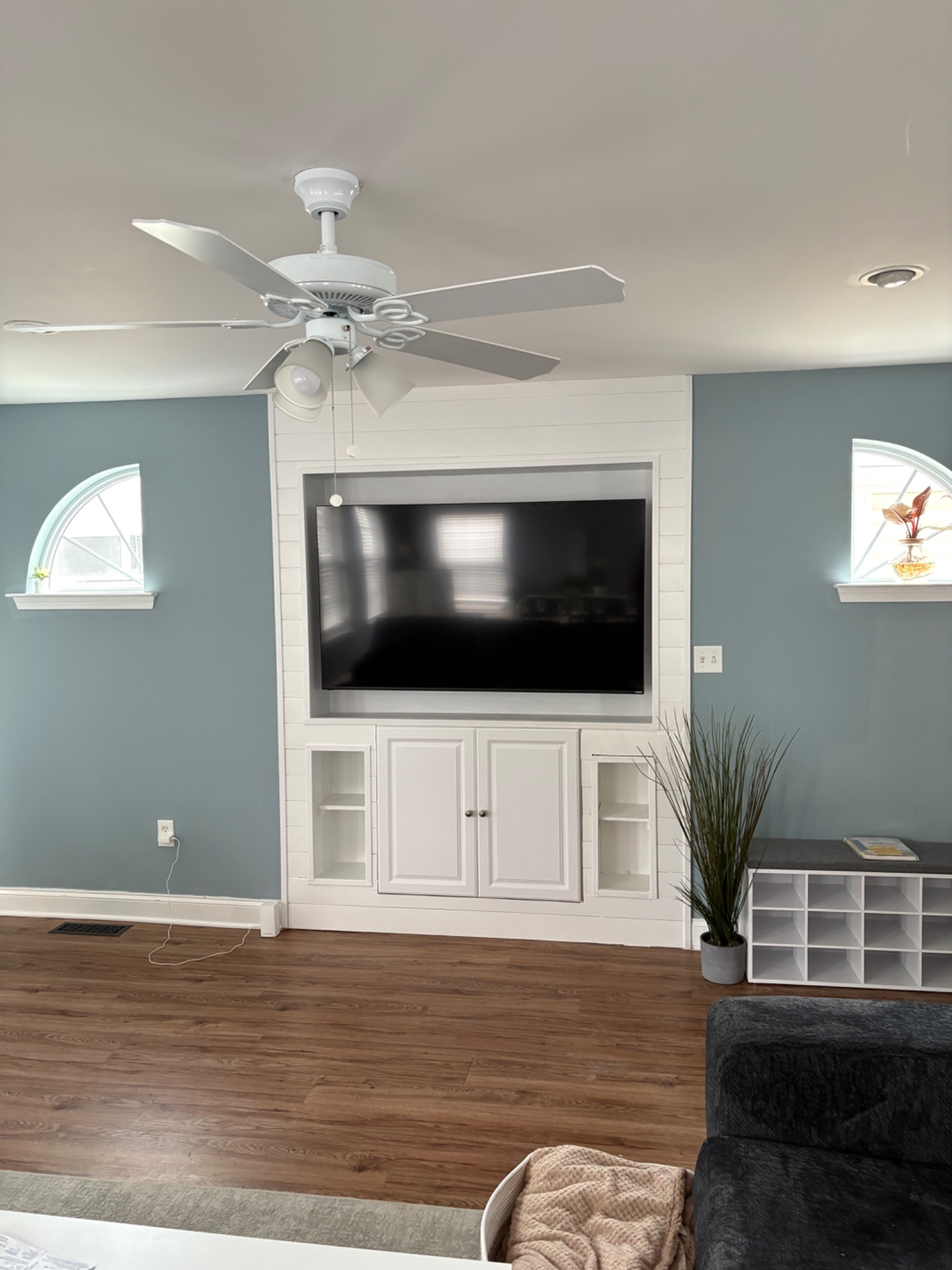 Custom inset shiplap Medial wall with built in cabinetry